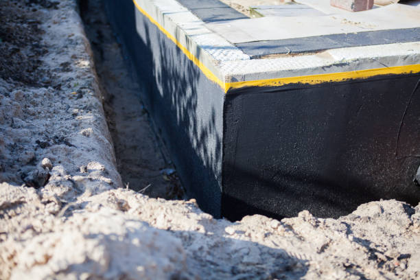 Professional Waterproofing technician working in Arpin, WI